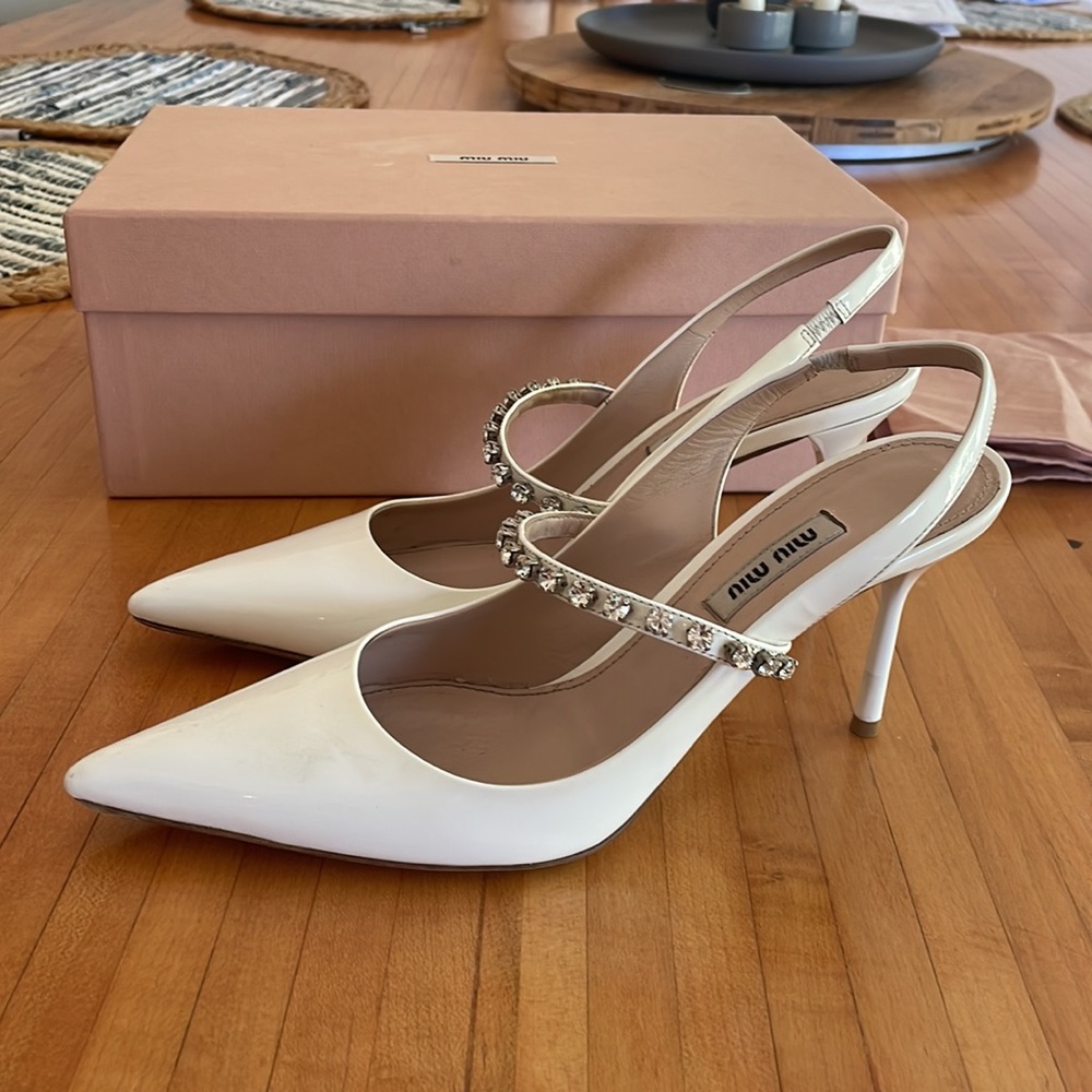Miu Miu patent leather sling back pump.